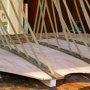 Glueing the back which is already cut to shape to the arched back bars.