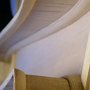 The sides' assembly rim is shaped to receive the domed back plate.