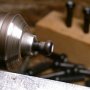 Shaping the bridge pins.